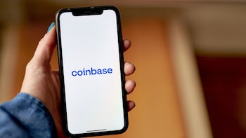 Coinbase to Cut 14% of Workforce, Citing Volatile Markets and AI