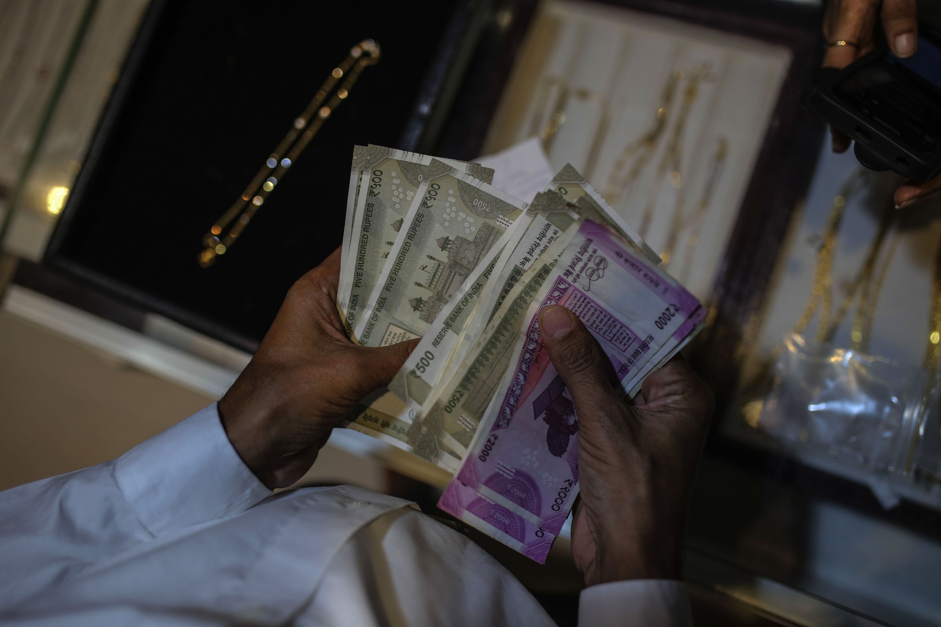 Historic Rupee Low Forecasts Grow as Oil Costs Widen Deficits