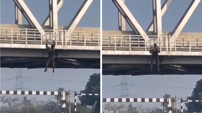 Video: Man Performs Chin-Ups While Hanging From Bridge Over Busy Highway