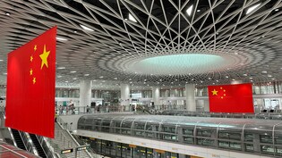 China Is About To Get A 'High-Income' Economy Tag. But Beijing Doesn't Want It