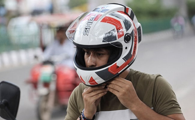 State-Funded Helmet Promises 'Fresh Air' In Battle On Winter Smog