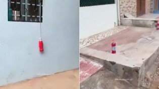 कानपुर में घरों के बाहर लटकी &lsquo;लाल बोतल&rsquo; ने मचाया हड़कंप, VIDEO वायरल होते ही लोगों ने पूछा एक ही सवाल