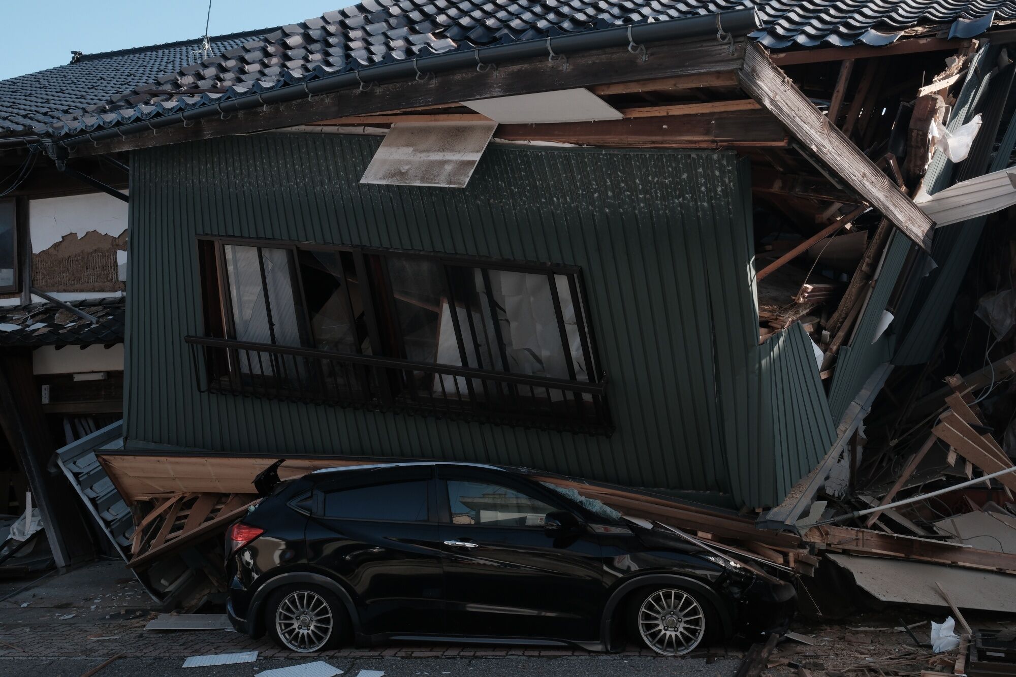 Japan Adds Rescuers As Toll From Jan. 1 Quake Rises To 64