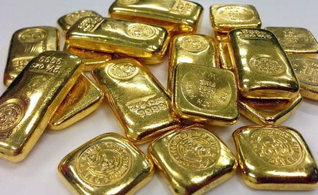 Gold Slips On Strong Dollar As Markets Await Big Fed Rate-Hike