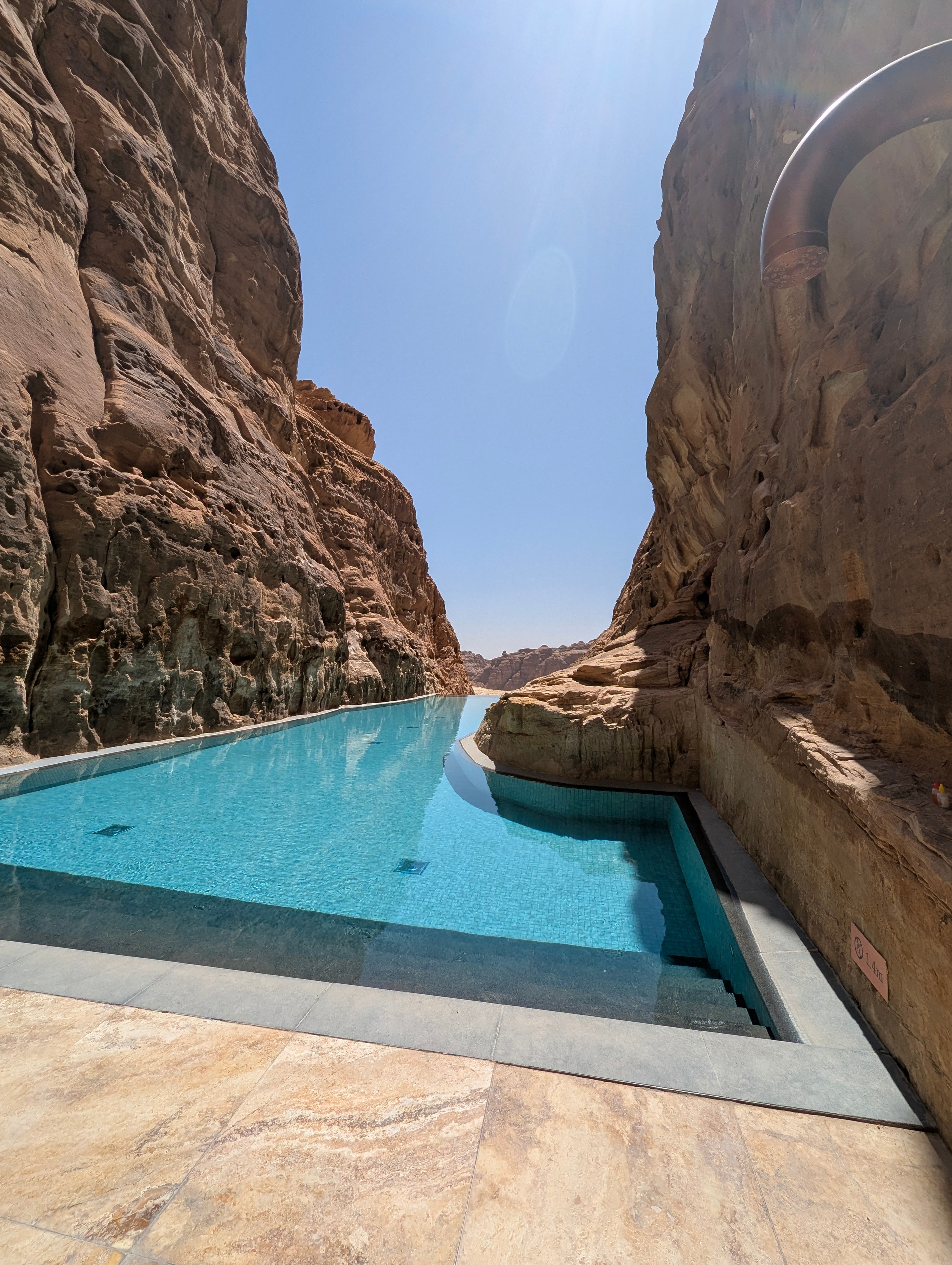 The swimming pool at Banyan Tree AlUla sits within the rocks. Photo: Author