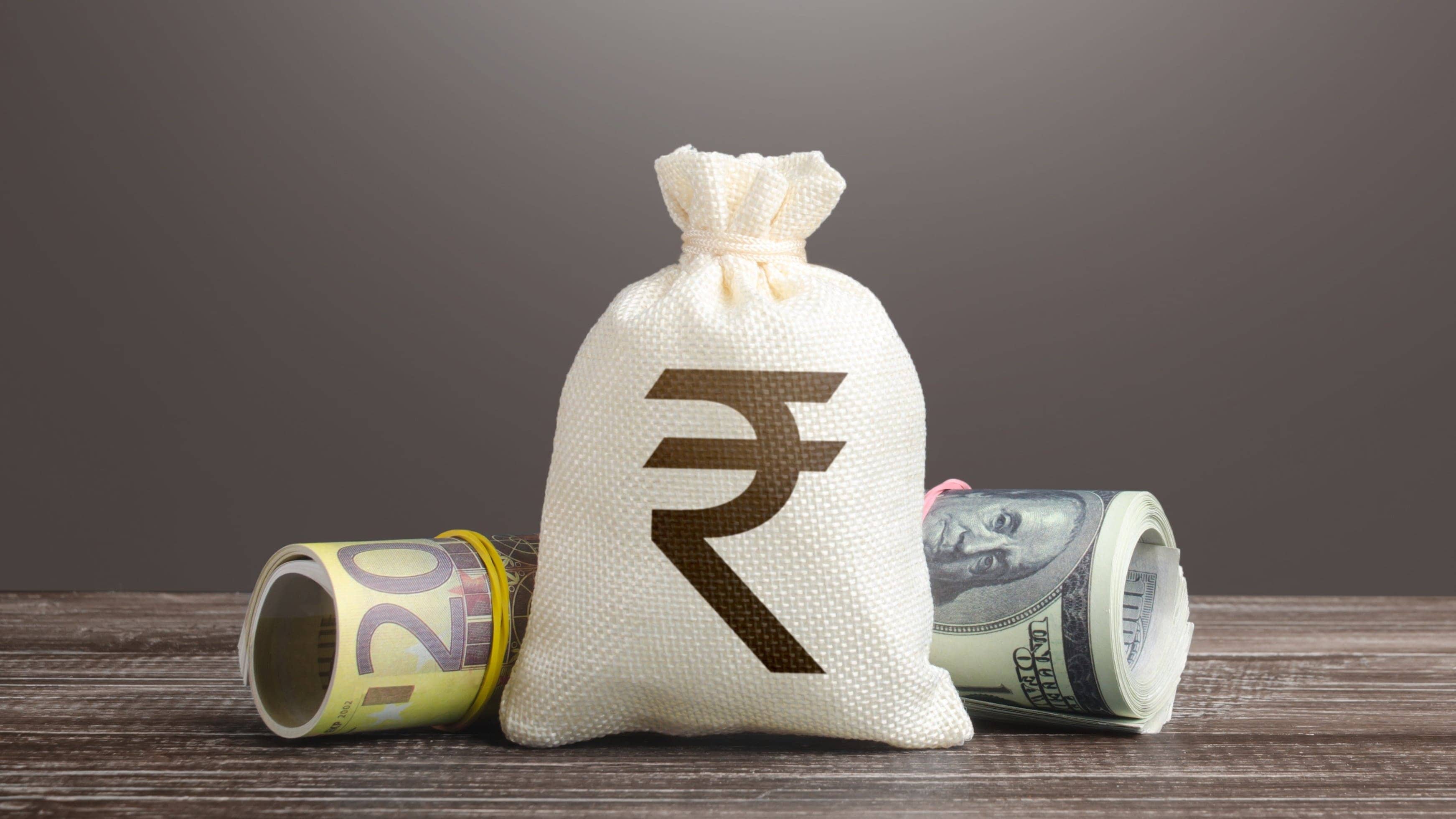 Rupee Closes Stronger Against Dollar After Fed's Rate Cut