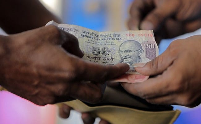 Rupee Declines 7 Paise To 82.11 Against US Dollar