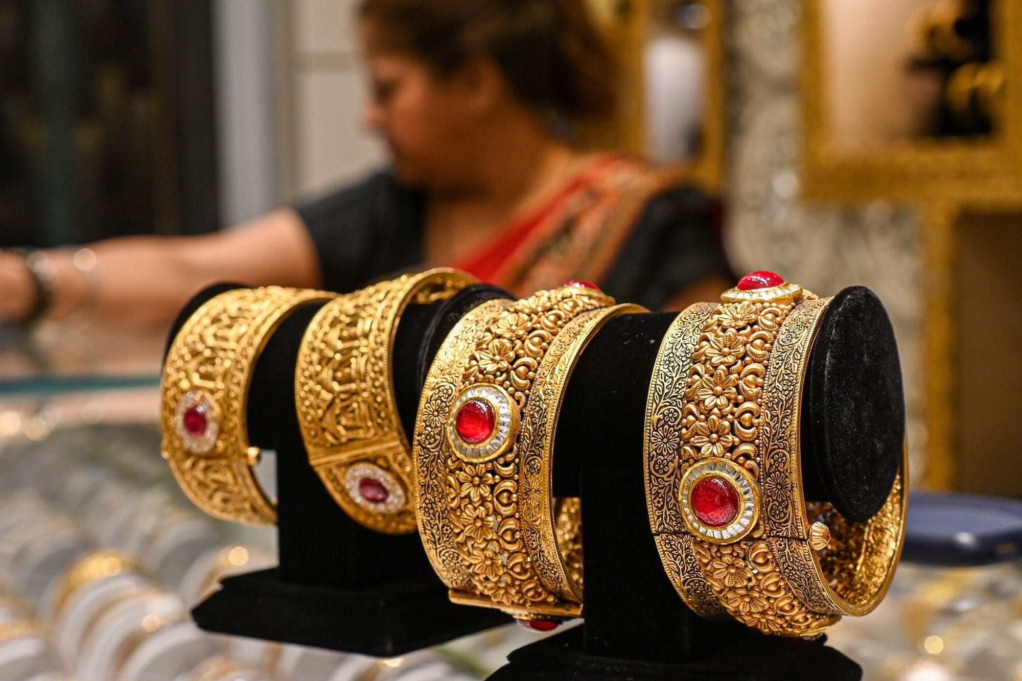 Gold Drops as Traders Mull Fed Path After US Job Openings Data