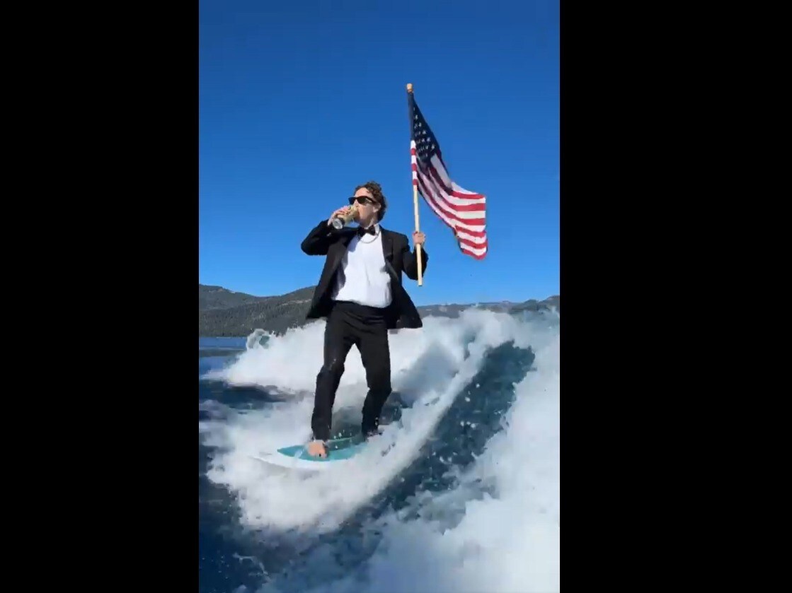 Mark Zuckerberg's Independence Day Celebration: Surfing In A Tux, Beer In Hand | WATCH