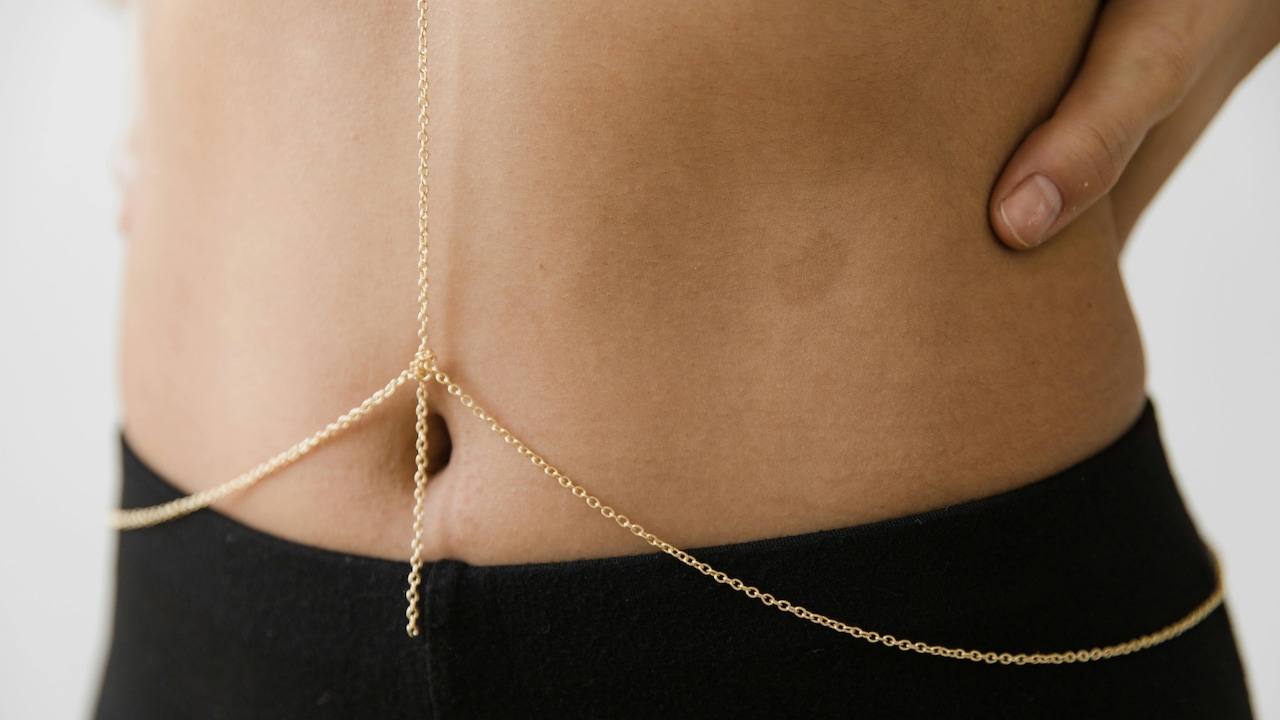 Metal belts are trending as versatile fashion accessories.