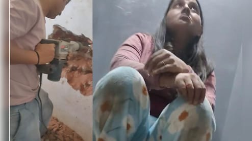 VIDEO: सोसायटी की लिफ्ट में 2 घंटे फंसी रही महिला, दीवार तोड़कर निकाला गया, उल्टी दिशा में दौड़ी थी लिफ्ट