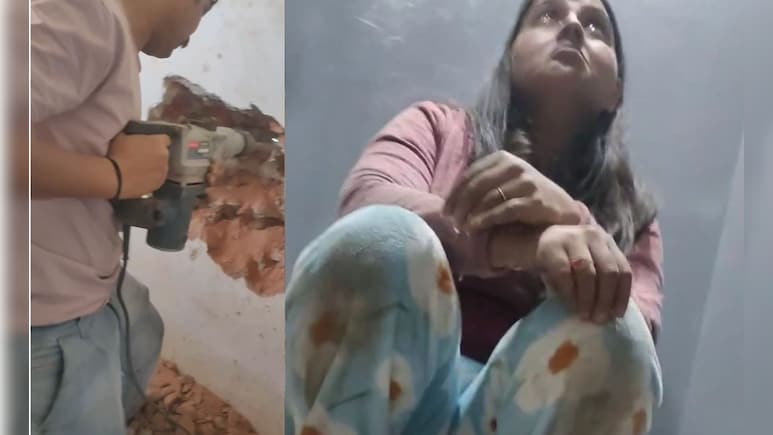 VIDEO: सोसायटी की लिफ्ट में 2 घंटे फंसी रही महिला, दीवार तोड़कर निकाला गया, उल्टी दिशा में दौड़ी थी लिफ्ट