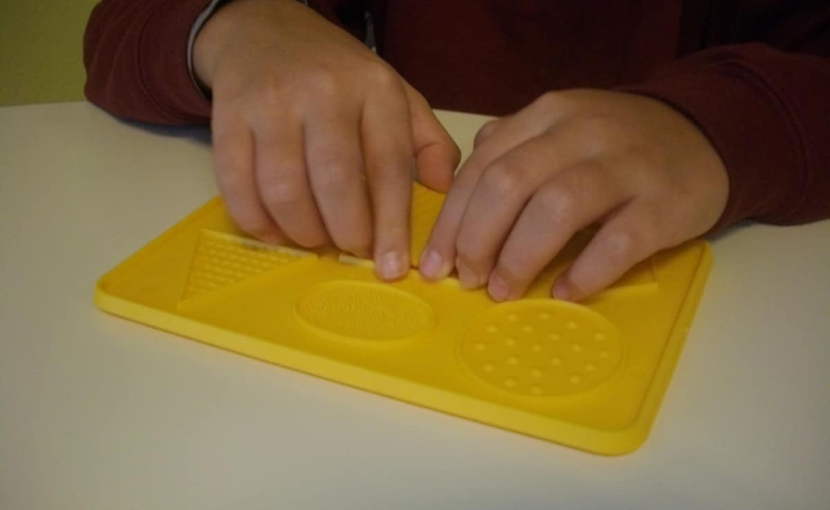 Young Ruzbeh, in his pre-braille classes Young Ruzbeh, in his pre-braille classes