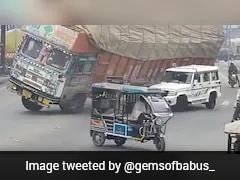 Truck Carrying Husk Overturns And Crushes Bolero, SUV Driver Dies On Spot