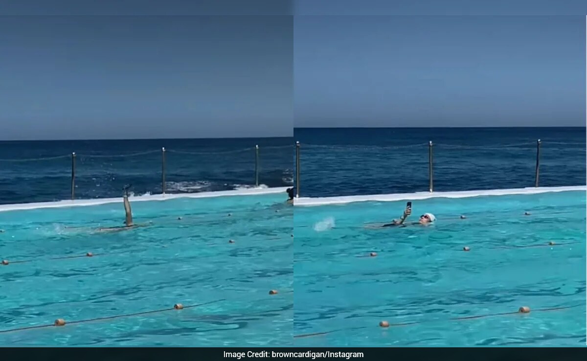 Woman Swimming With Phone Sparks Debate