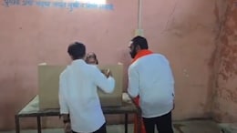 Video: Sena MLA Enters Poll Booth, Shows Party Symbol To Woman Casting Vote