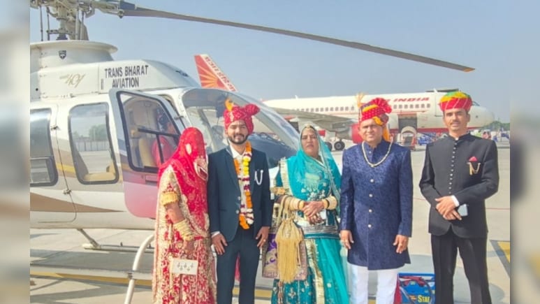 Jodhpur News: हेलीकॉप्टर से गांव पहुंचे दूल्हा-दुल्हन, देखकर दंग रह गए ग्रामीण; पूरे गांव में बरसे फूल