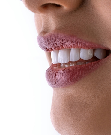 7 Dental Health Benefits Of Clove-Infused Coconut Oil