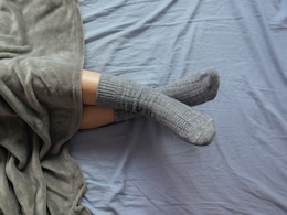 Should You Sleep With Your Socks On In Winters? Health Pros And Cons Explained