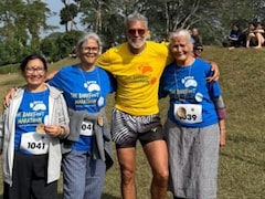 Milind Soman Completes Barefoot Marathon In Coorg With Wife Ankita Konwar And Mother Usha