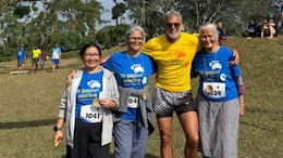 Milind Soman Completes Barefoot Marathon In Coorg With Wife Ankita Konwar And Mother Usha