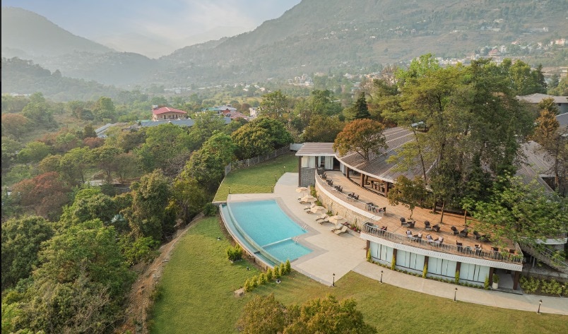 The pool and the restaurant. Photo: Naukuchia House The pool and the restaurant. Photo: Naukuchia House