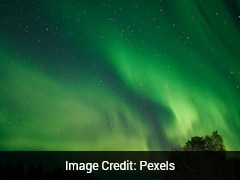 Green And Purple Auroras Are Lighting Up Skies Far Beyond The Poles, Here's Why