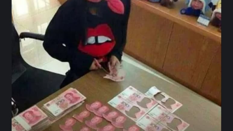 Girl Cuts Mao's Portrait From Yuan Notes, Destroying Chunk Of Family's Savings