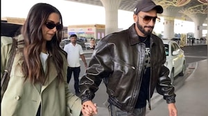 <i>Dhurandhar</i> Star Ranveer, Deepika Walk Hand-In-Hand At Mumbai Airport​