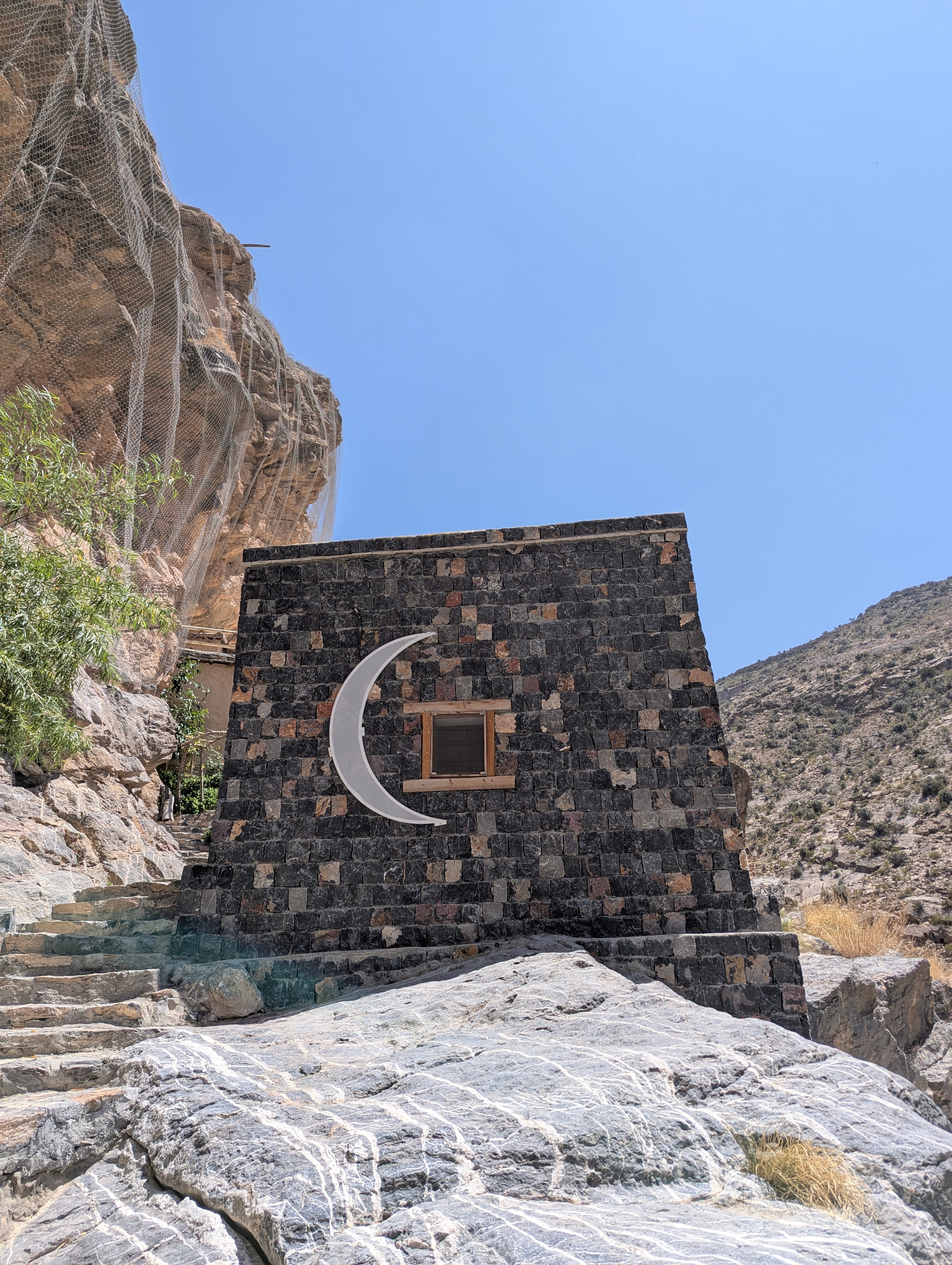 The stone facade with a crescent. Photo: Author The stone facade with a crescent. Photo: Author