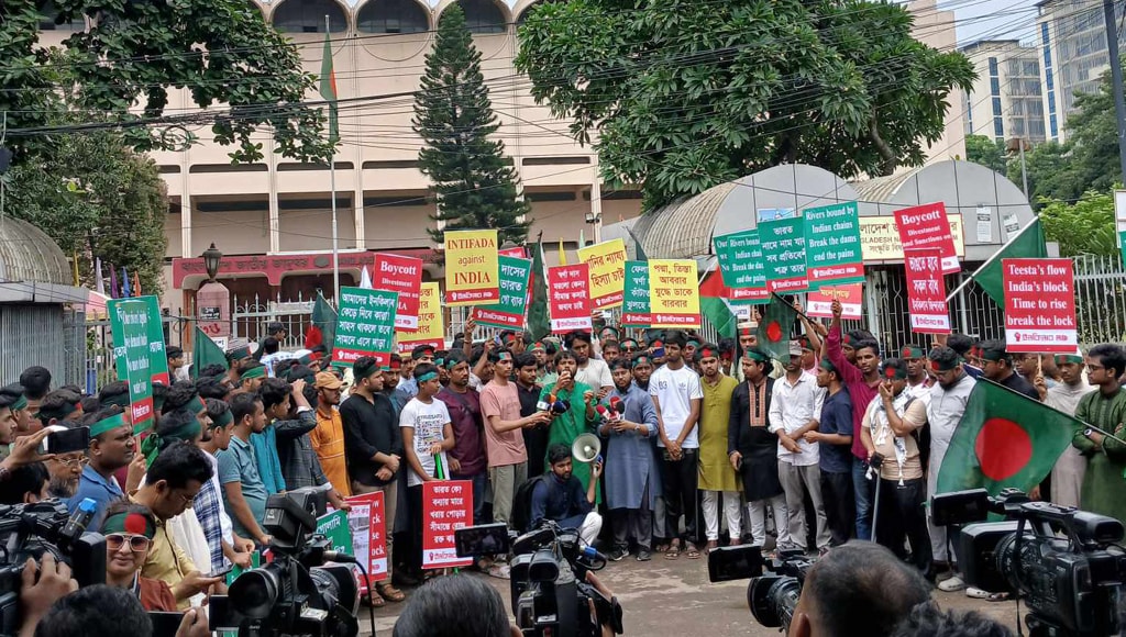 Hadi and other Inquilab Mancho members calling for an "intidifa" (uprising) against India at a protest march last year. Credit: New Age Hadi and other Inquilab Mancho members calling for an "intidifa" (uprising) against India at a protest march last year. Credit: New Age