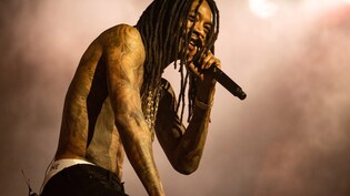 Rapper Wiz Khalifa Smokes Weed Onstage At Romania Concert, Sentenced To 9 Months In Prison