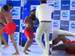 बाबा रामदेव ने पत्रकार के साथ की जोर आजमाइश, वायरल वीडियो में देखिए कौन पड़ा भारी