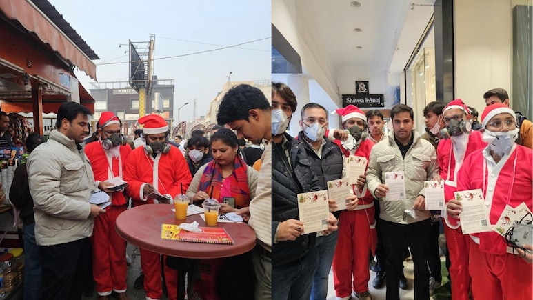 'Santas' In Gas Masks Hit Delhi Streets To Protest Air Pollution