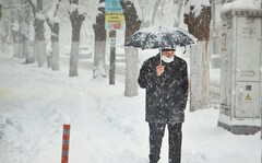 Snow Covers Second-Floor Apartment Of High-Rise Building In Russia's Kamchatka