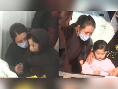 Prashant Tamang's Wife Martha Breaks Down Paying Last Respects To Her Husband With Their Daughter