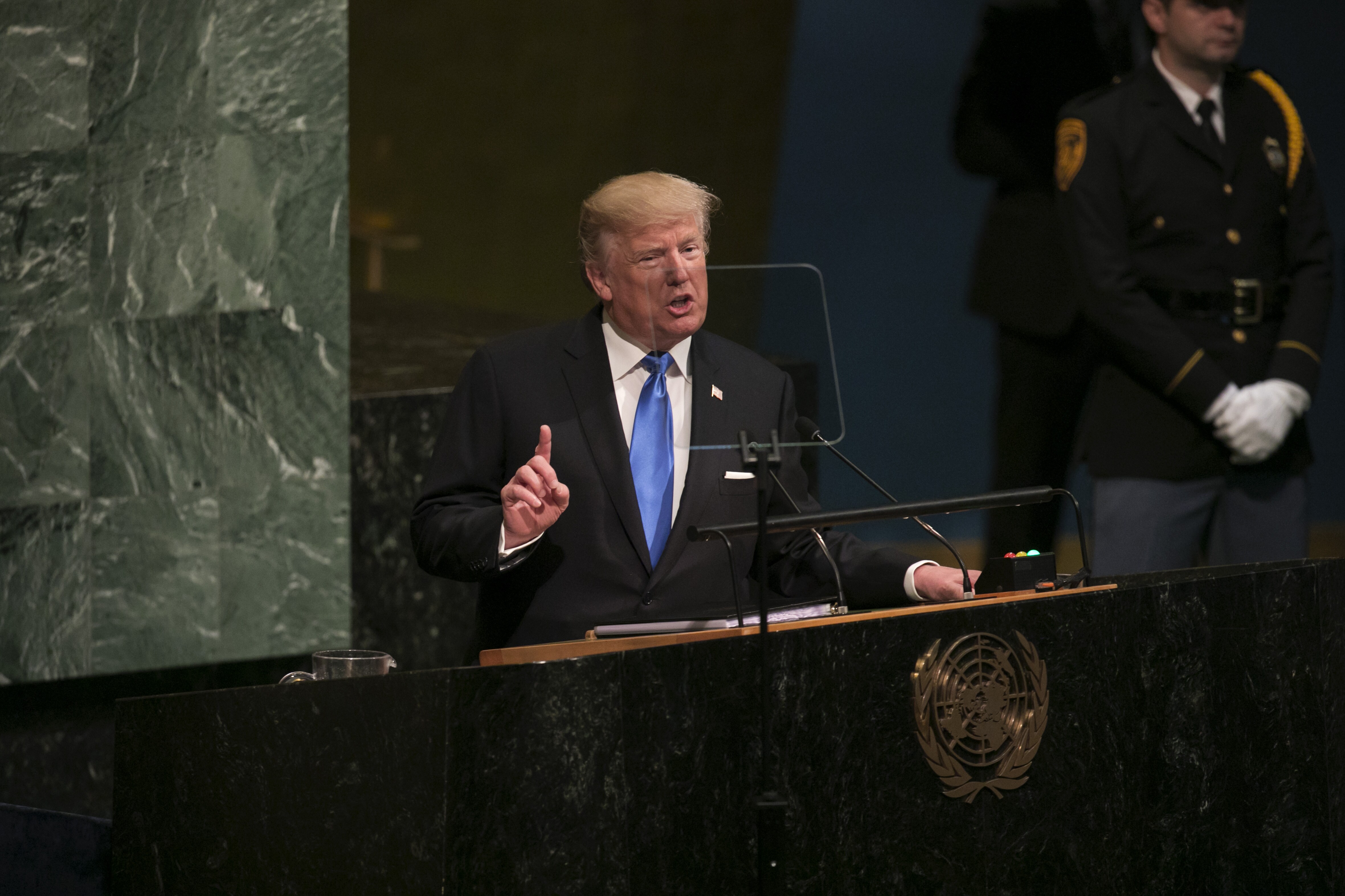 Trump Scorns `Madman' Kim After Threat of H-Bomb Test at Sea