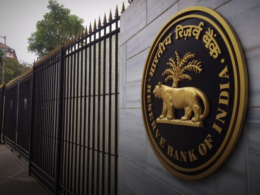 RBI Keeps Rates Unchanged, Slashes Growth Forecast