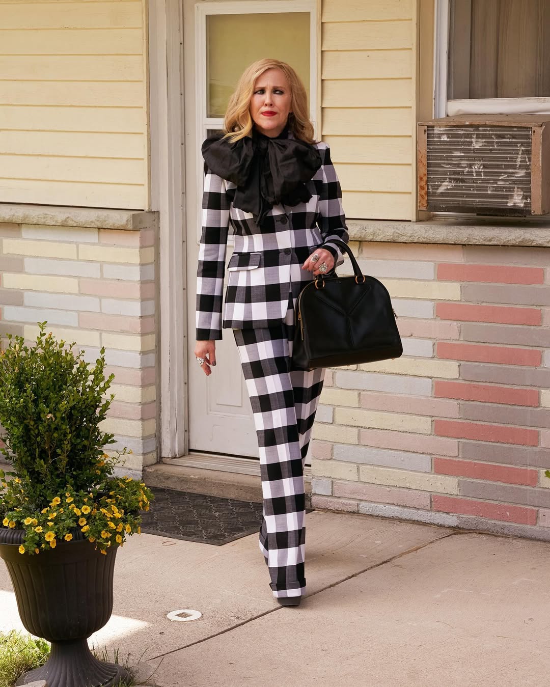 Moira Rose in a gingham suit Moira Rose in a gingham suit