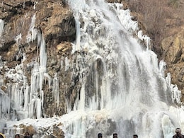 Pics: Frozen Waterfall Draws Tourists In Gulmarg, Cold Wave Persists In J&K