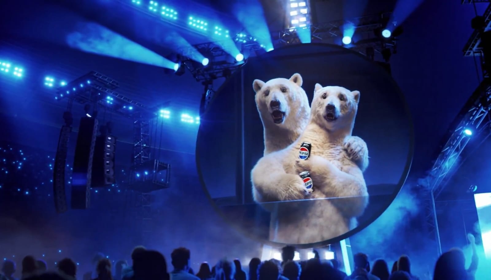 Viral: New Pepsi Ad Has Coca-Cola Bear 'Cheating' In Coldplay Kiss Cam Twist