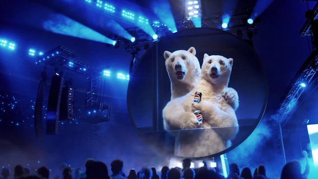 New Pepsi Ad Shows Coca-Cola Polar Bear 'Cheating' In Coldplay Kiss Cam Twist. Viral Video