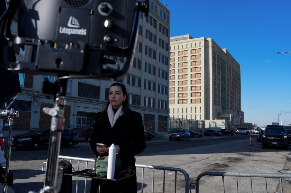 A member of the media near the Metropolitan Detention Center, where ousted Venezuelan President Nicolas Maduro is being held, in the Brooklyn borough of New York, on Jan. 4.