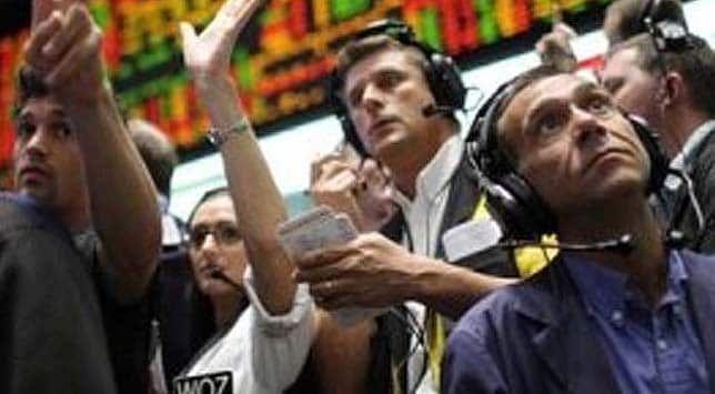Dow breaks 13,000 but can't hold gains