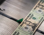 Dollar Set For Worst Week Since June On US 'Policy Nightmare'