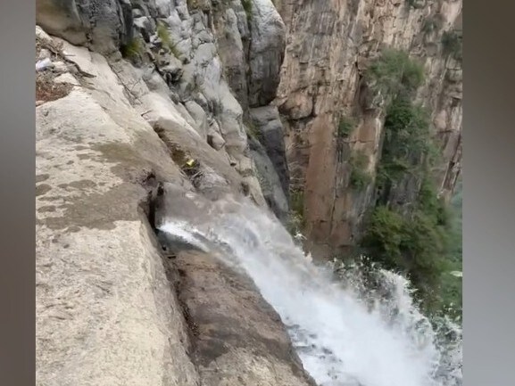 China: Viral Video Shows Yuntai Waterfall Being Supplied Water Through Pipes | WATCH