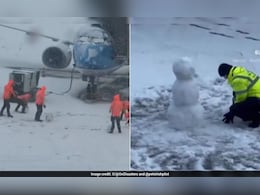 Watch: Snow Causes Flight Cancellations At Schiphol Airport, Staff Member Makes 'Snowman'