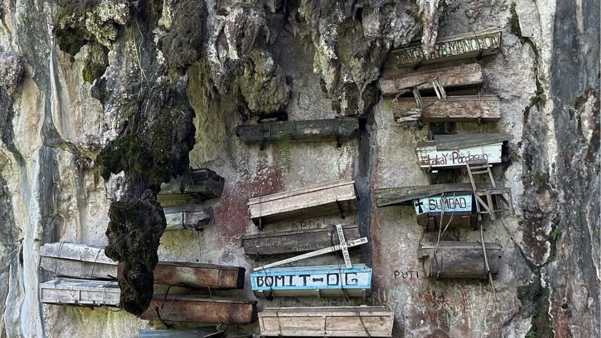 Why This Tribe In The Philippines Hangs Coffins From Cliffs