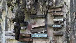 Why This Tribe In The Philippines Hangs Coffins From Cliffs