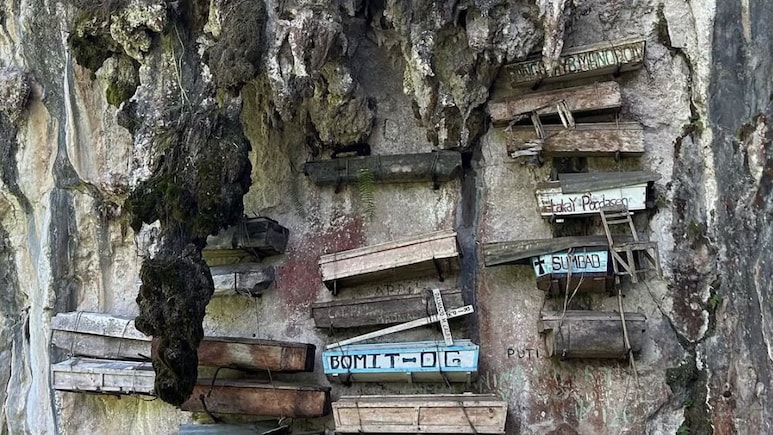 Why This Tribe In The Philippines Hangs Coffins From Cliffs
